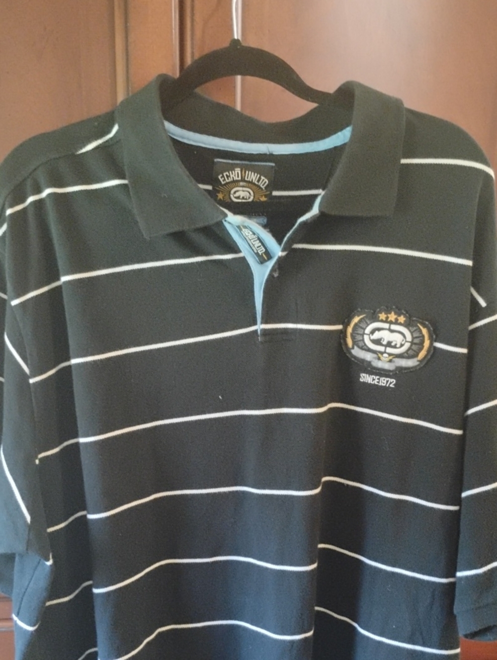 Ecko Unlimited Black Polo with White Stripes and Light Blue Trim